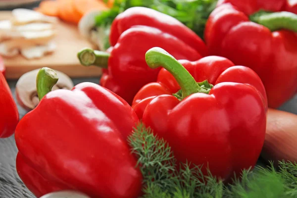 Ripe red peppers on table — Stock Photo, Image