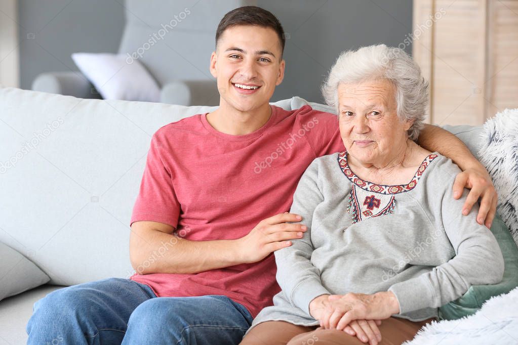Senior woman with her grandson at home