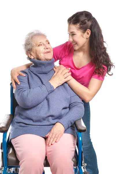 Mujer feliz con la abuela sobre fondo blanco —  Fotos de Stock