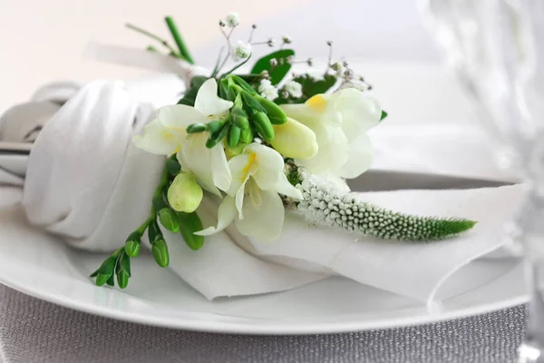 Beautiful table setting with fresh freesia flowers, closeup — Stock Photo, Image