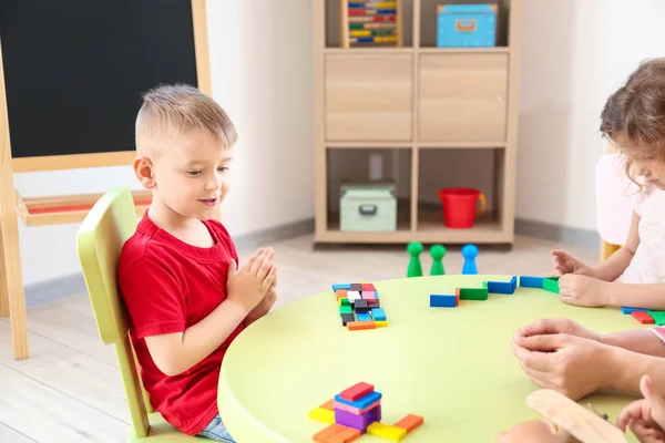 Cute little children playing in kindergarten — Stock Photo, Image