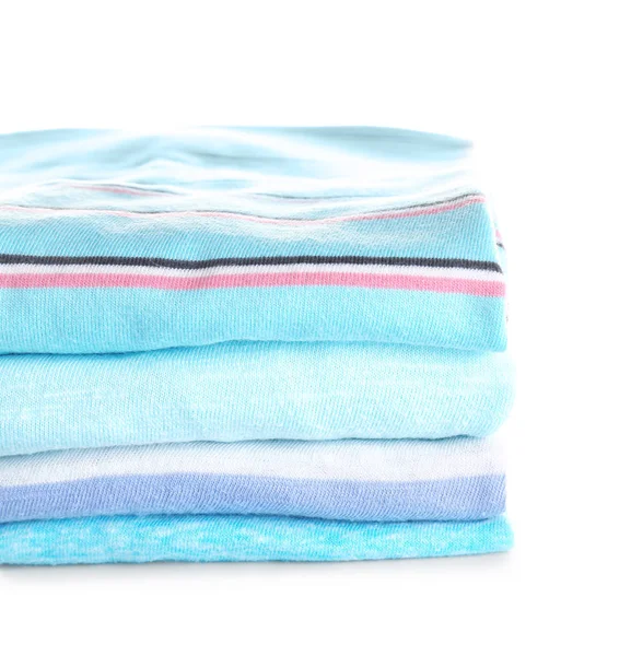 Stack of modern clothes on white background — Stock Photo, Image