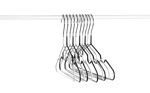 Rack with clothes hangers on white background — Stock Photo, Image