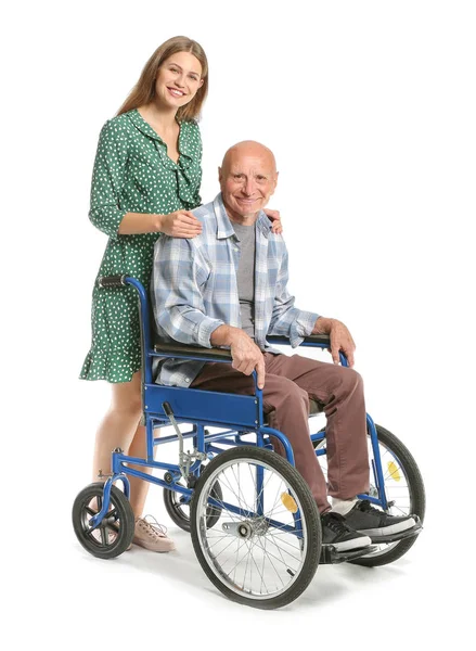 Hombre anciano discapacitado con hija sobre fondo blanco — Foto de Stock