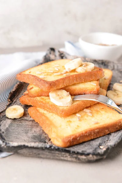 Tasty French toasts and banana on plate — Stock Photo, Image