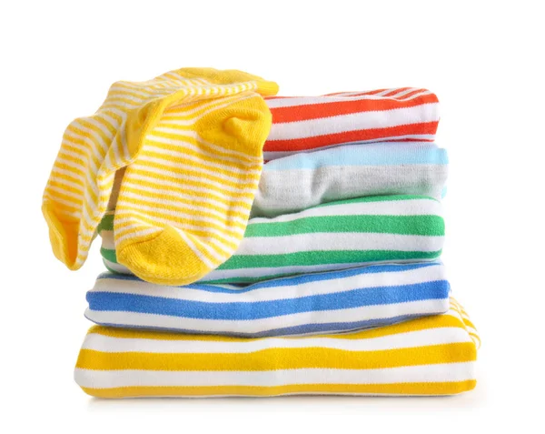 Stack of baby clothes on white background — Stock Photo, Image