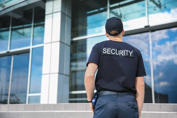 Handsome male security guard outdoors — Stock Photo, Image