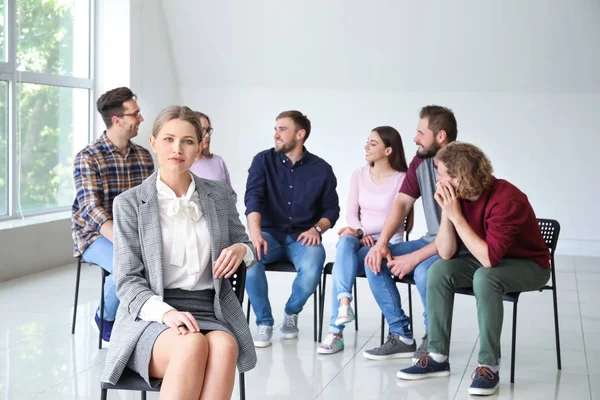 Female psychologist at group therapy session — Stock Photo, Image