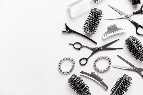 Set of hairdresser tools and accessories on white background — Stock Photo, Image