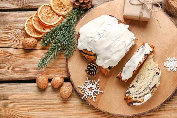 Composition with tasty cut poppy pastry and Christmas decor on table — Stock Photo, Image