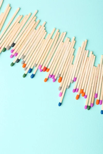 Many matches on color background — Stock Photo, Image