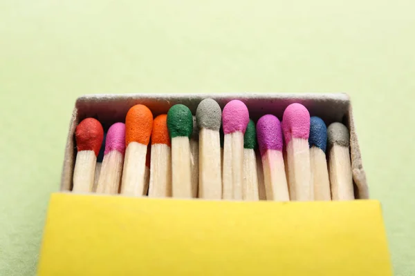 Box with matches on color background, closeup — Stock Photo, Image