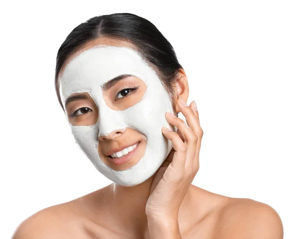 Beautiful Asian woman with facial mask on white background — Stock Photo, Image