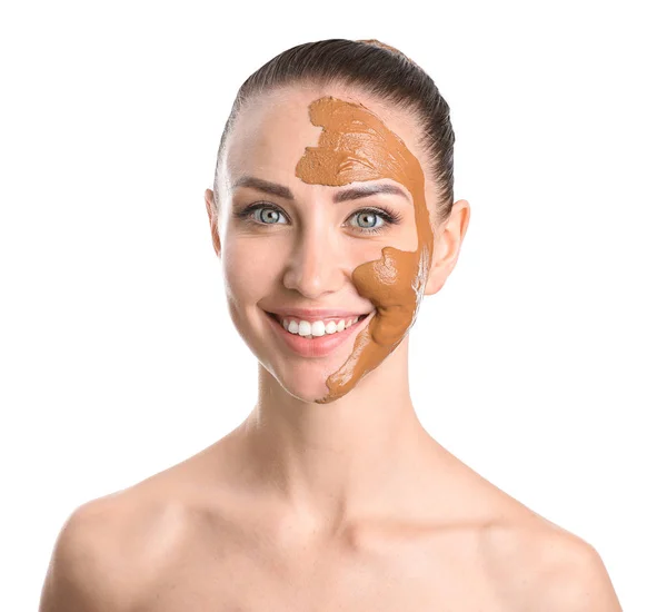 Beautiful young woman with facial mask on white background — Stock Photo, Image