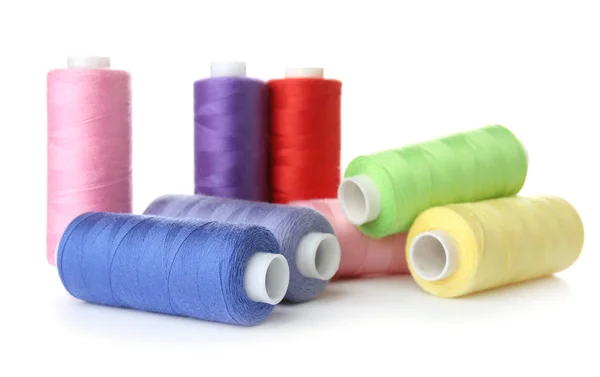 Colorful sewing threads on white background — Stock Photo, Image