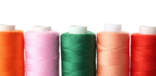 Colorful sewing threads on white background — Stock Photo, Image