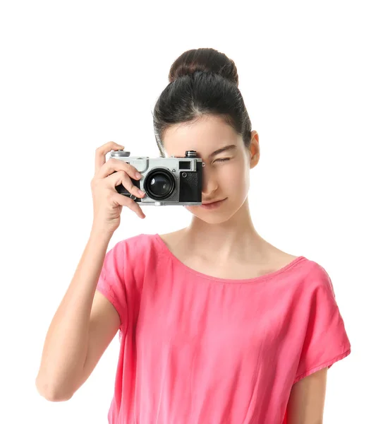 Menina com câmera de foto no fundo branco — Fotografia de Stock