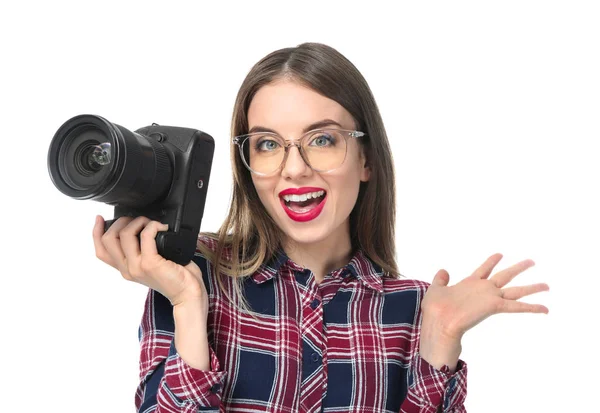 Young female photographer on white background — Stock Photo, Image