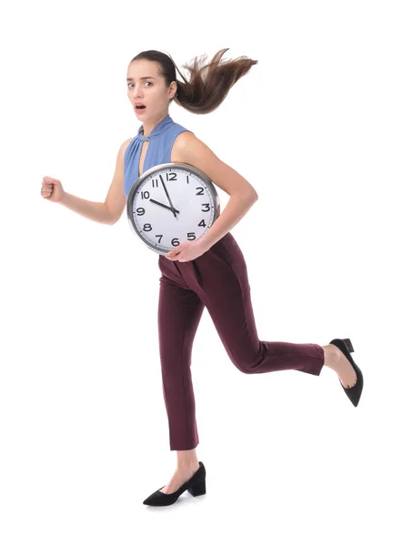 Correndo jovem empresária com relógio no fundo branco — Fotografia de Stock
