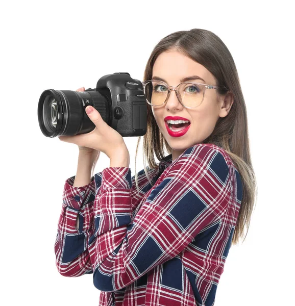 Young female photographer on white background — Stock Photo, Image