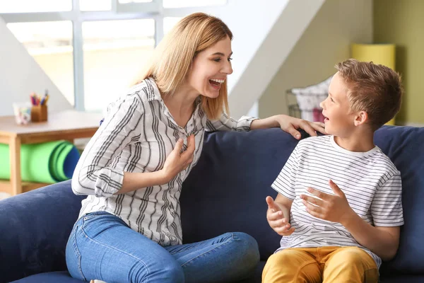 Happy woman with little adopted boy at home — Stock Photo, Image