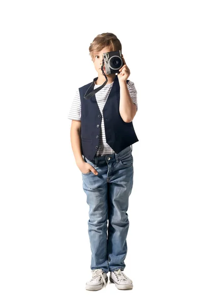 Cute little photographer with professional camera on white background — Stock Photo, Image