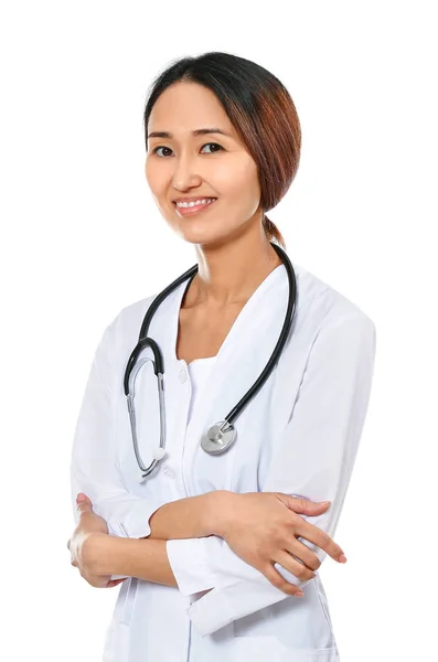 Жіночий Азіатський лікар на білому фоні — стокове фото