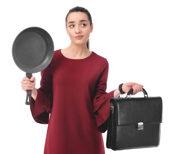 Thoughtful businesswoman with briefcase and frying pan on white background — Stock Photo, Image