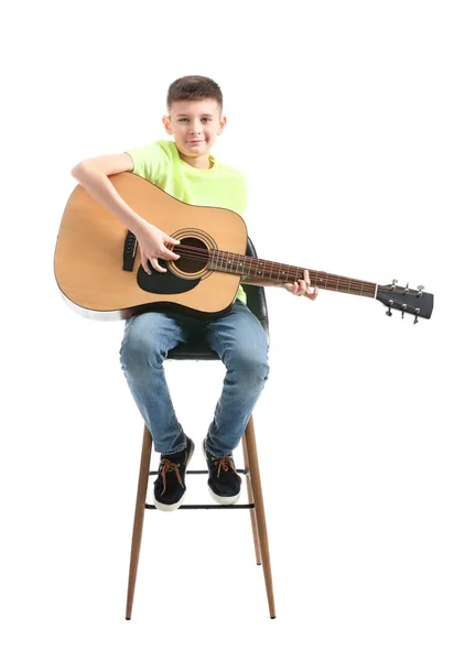 Teenage boy playing guitar against white background — Stock Photo, Image