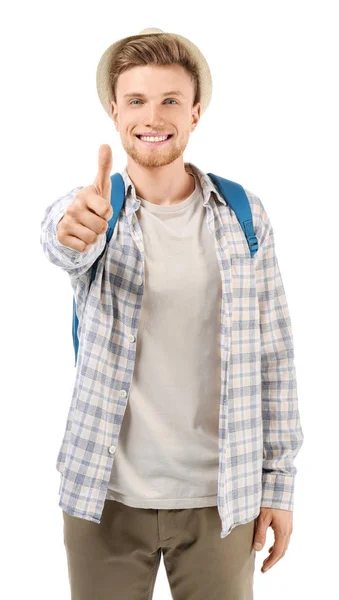 Joven turista mostrando gesto de pulgar hacia arriba sobre fondo blanco — Foto de Stock