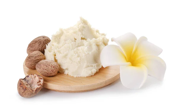 Board with shea butter on white background — Stock Photo, Image