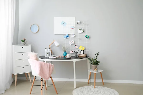 Stylish workplace with mood board at home — Stock Photo, Image