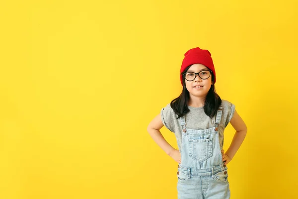 Portrait of stylish little girl on color background — Stock Photo, Image
