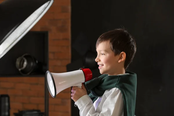 Little film director with megaphone in studio — Stock Photo, Image