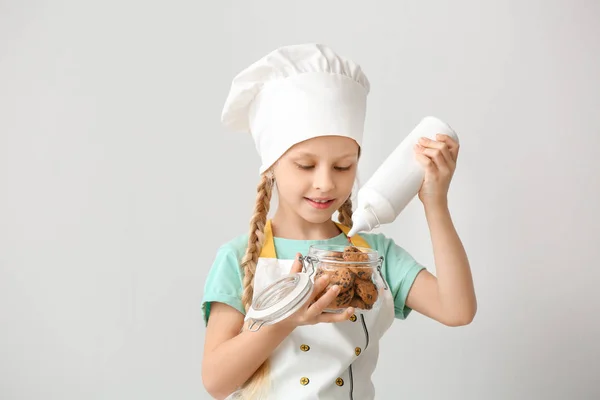 Cute little confectioner on white background — Stock Photo, Image