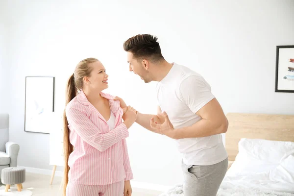 Young couple quarrelling in bedroom — Stock Photo, Image