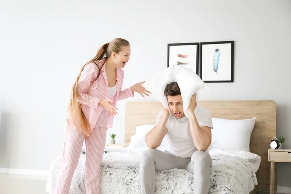 Young couple quarrelling in bedroom — Stock Photo, Image