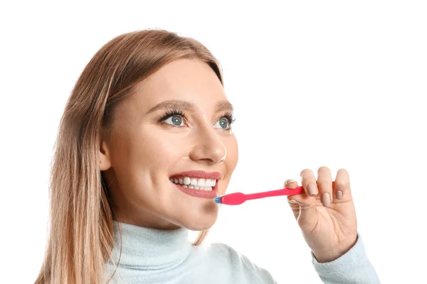 Woman cleaning teeth on white background — Stock Photo, Image