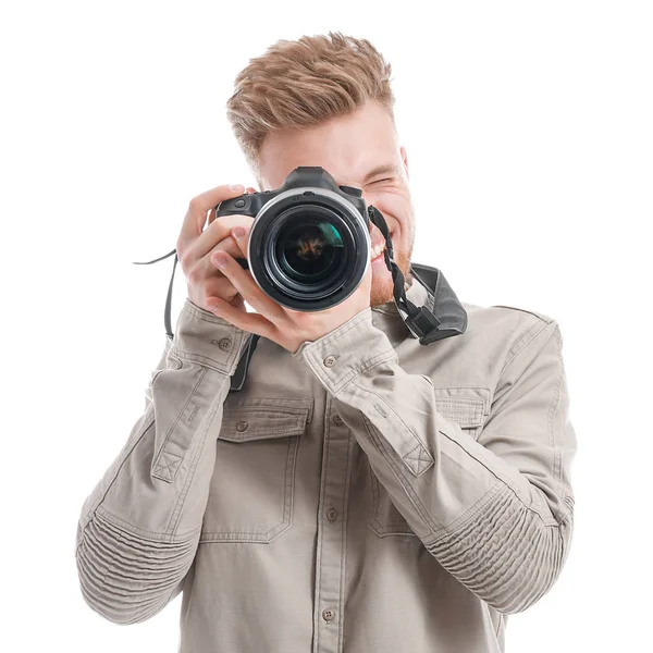 Fiatal férfi fotográfus, fehér háttér — Stock Fotó