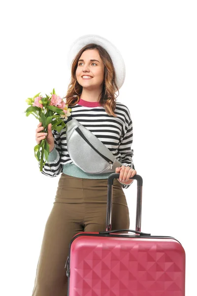Жінка-туристка з багажем і квітами на білому тлі — стокове фото