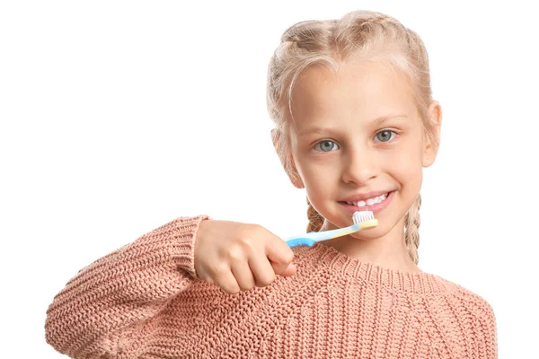 Klein meisje schoonmaken tanden op witte achtergrond — Stockfoto