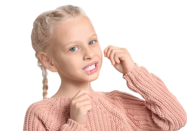 Bambina filo interdentale denti su sfondo bianco — Foto Stock