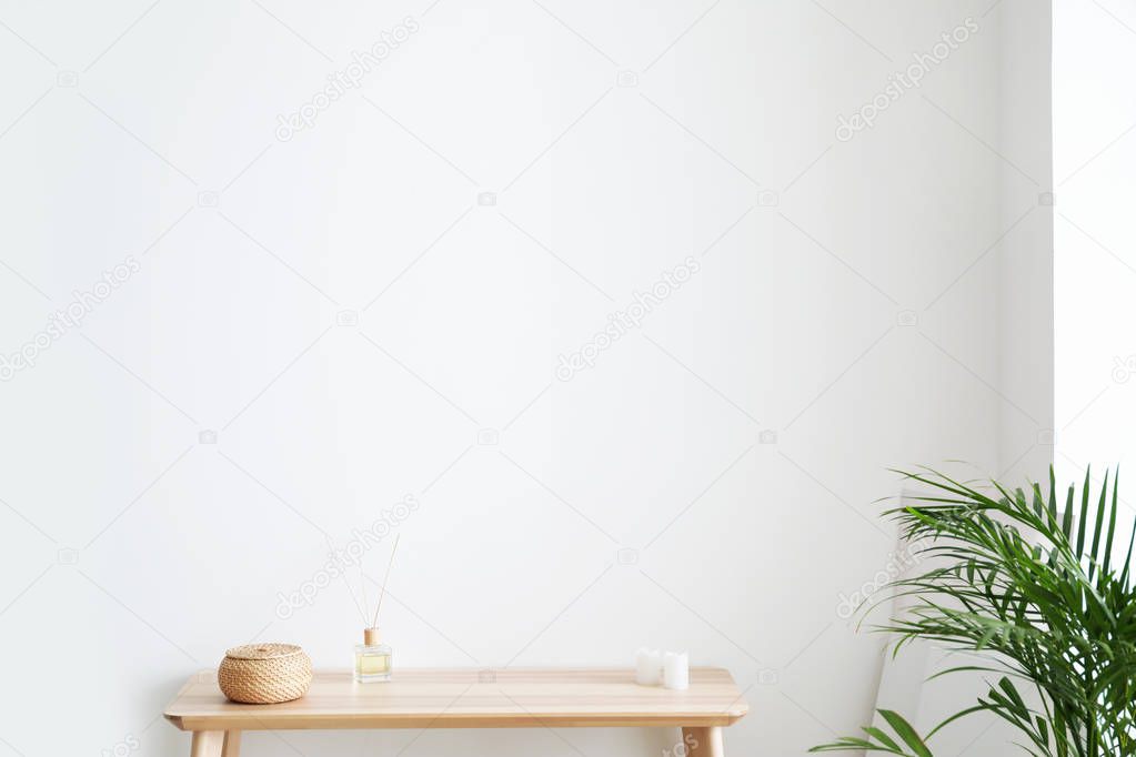 Table in living room near light wall