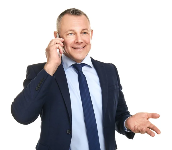 Handsome middle-aged businessman talking by mobile phone on white background — Stock Photo, Image