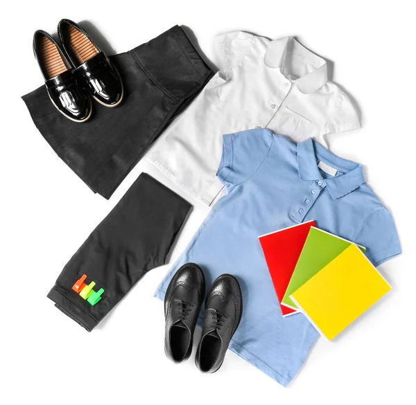 School uniform and stationery on white background — Stock Photo, Image