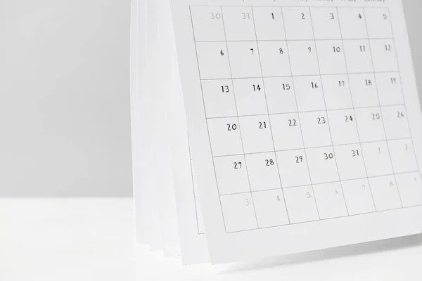 Flip calendar on light background, closeup — Stock Photo, Image