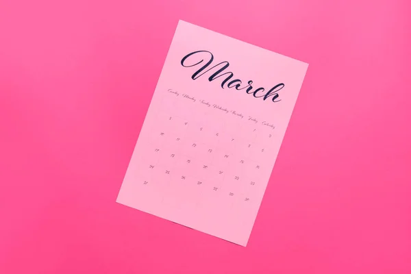 Sheet of paper calendar on color background — Stock Photo, Image