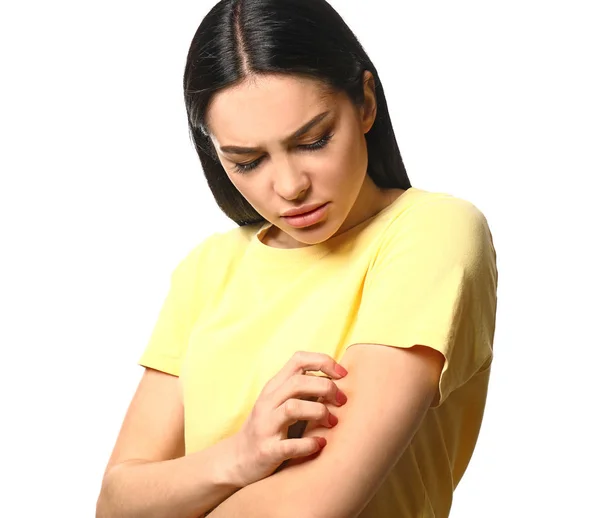 Young woman with skin allergy on white background — Stock Photo, Image