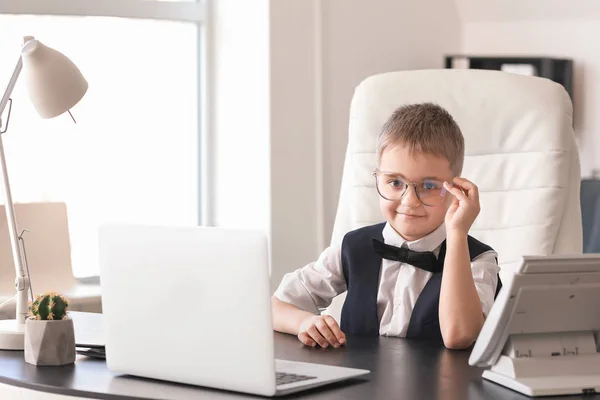 Cute little businessman in office — Stock Photo, Image