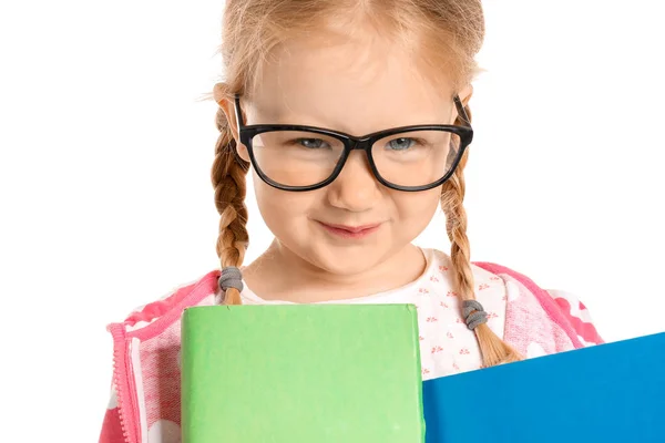 Porträt eines entzückenden kleinen Mädchens mit Büchern auf weißem Hintergrund — Stockfoto